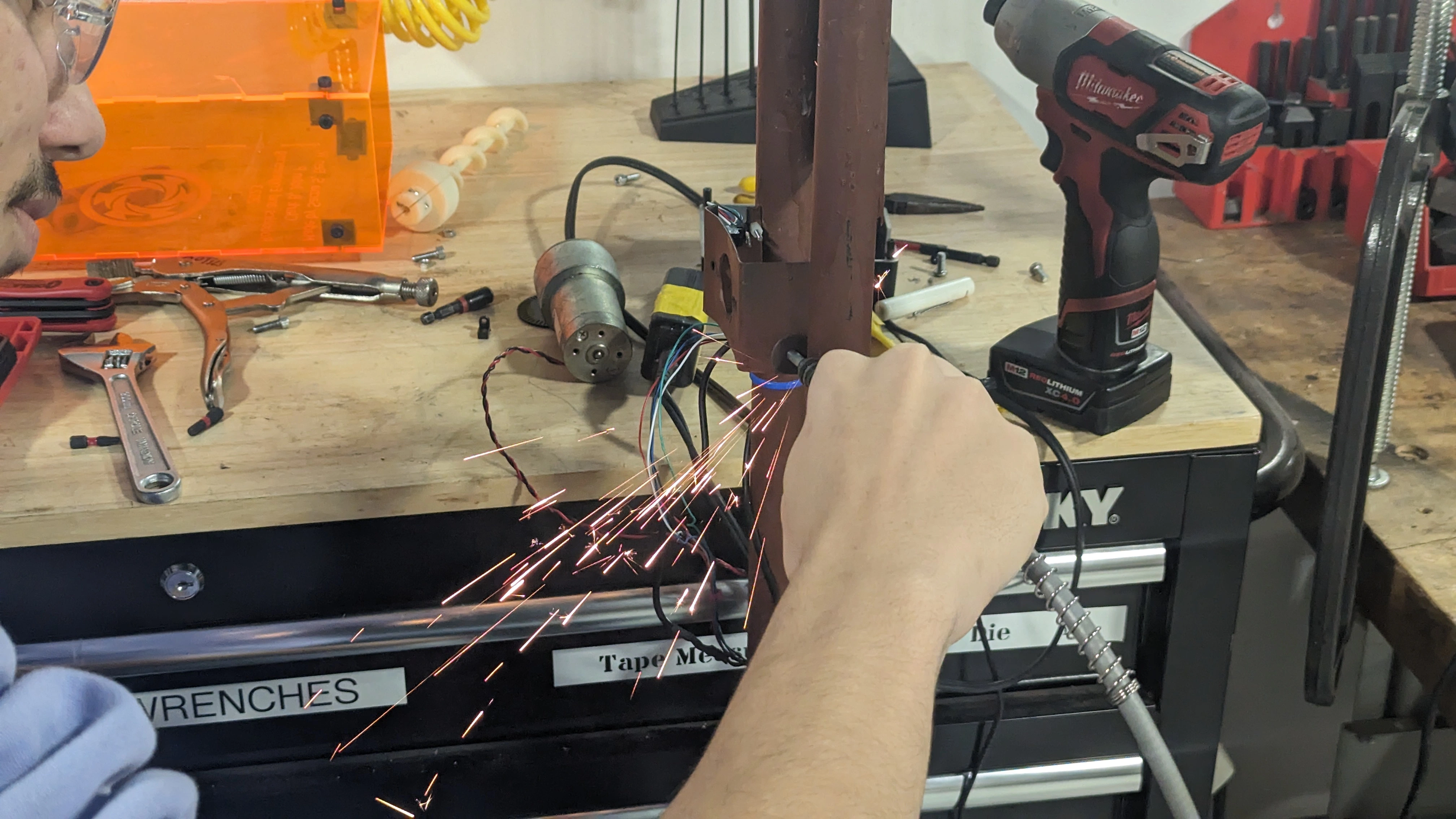 Joao cutting the electronics enclosure open